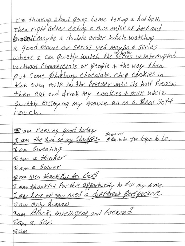 A notebook page with text reading 