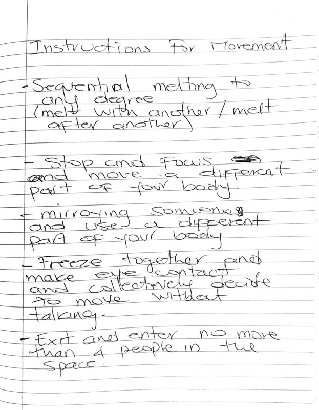 A notebook page with text reading 