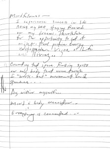 A notebook page with an indecipherable image, and text reading 