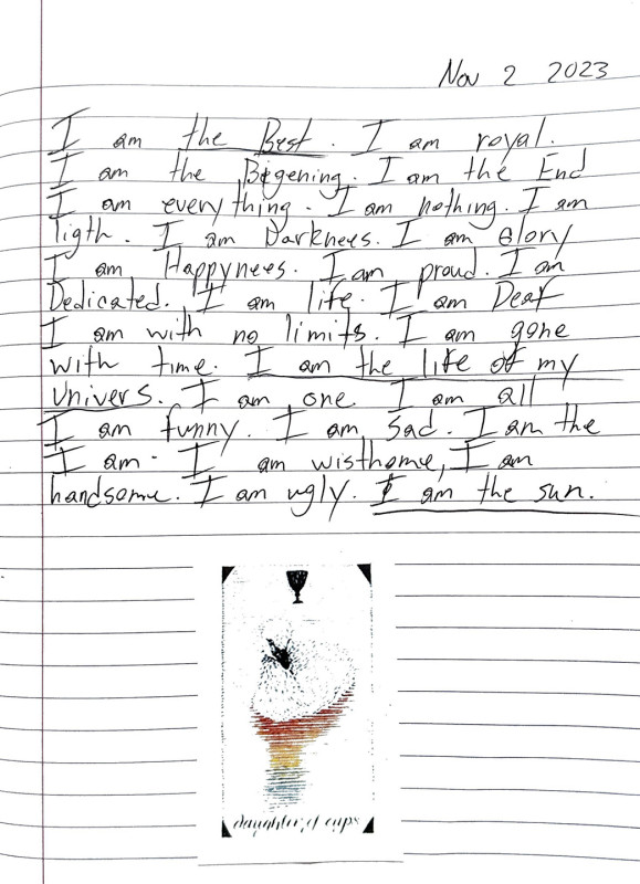 A notebook page with an indecipherable image, and text reading 