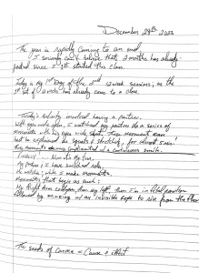 A notebook page with text reading 