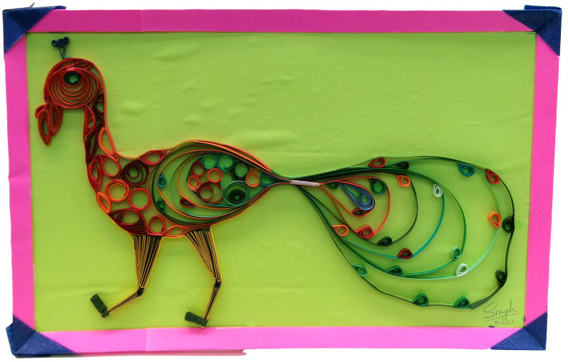 A bas-relief sculpture made from paper that has been rolled, and placed to create a shape like a peacock. The peacock is brightly colored, mainly warm tones for the body and cool tones for the tail. It is placed against a lime green background, with a hot pink border defined with navy blue corners.